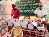 School stationery distribution Asalwadi gaon